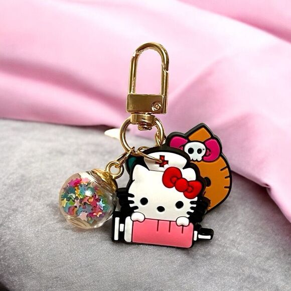 Hello Kitty Nurse Confetti Ball Gold Tone Bag Charm Zipper Pull - Picture 1 of 2